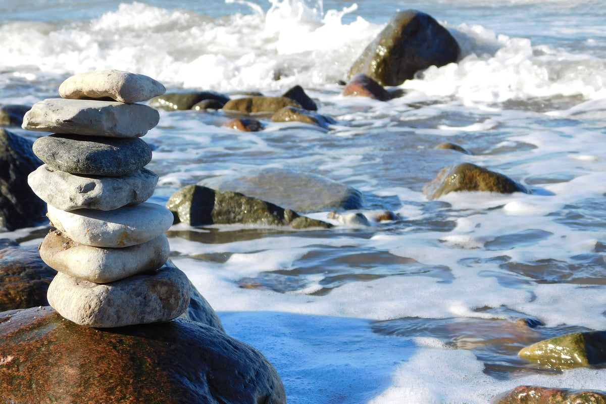 framedposter-print-stone-pile-at-the-sea